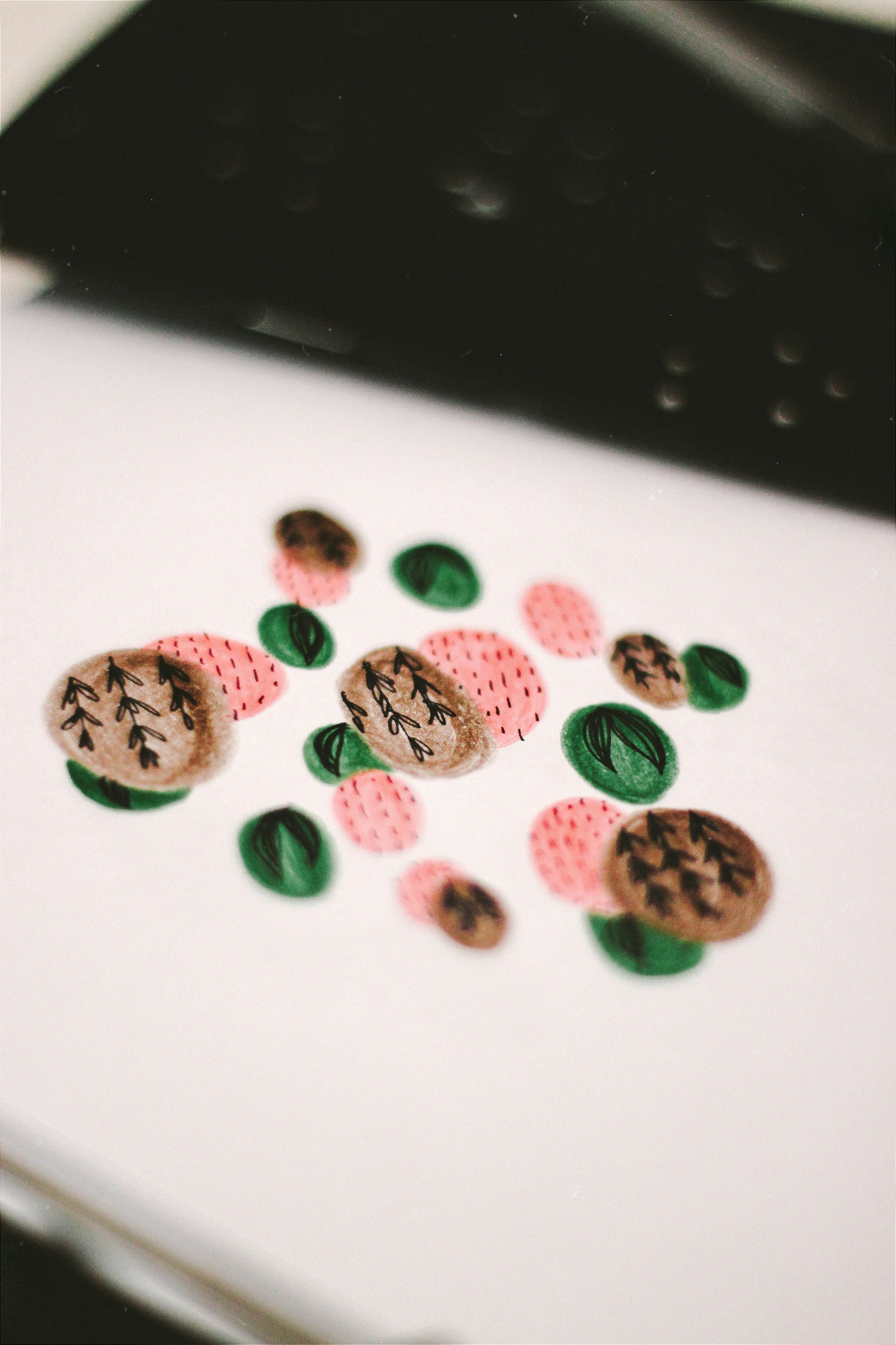 brown green and red round cookies